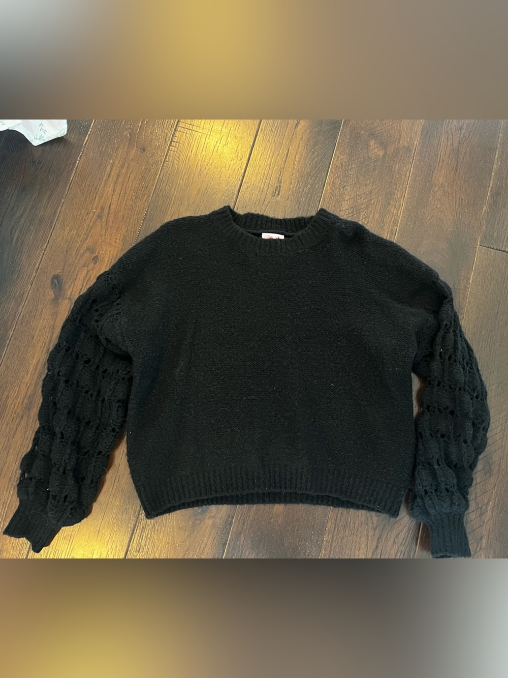 She’s the center of attention black sweater